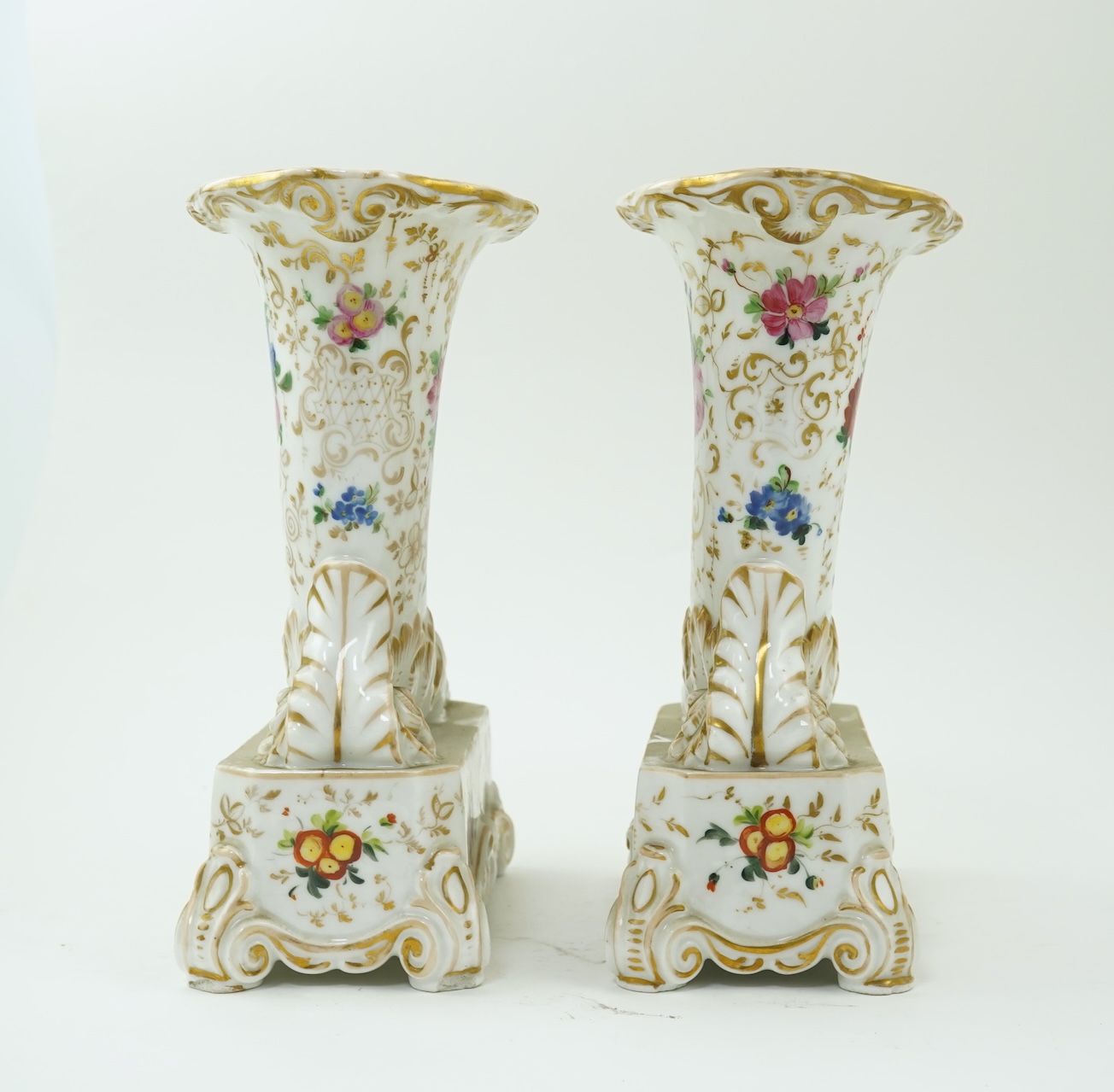 A pair of Paris porcelain cornucopia vases, mid 19th century